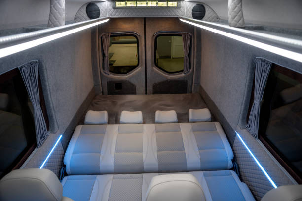 istock Comfortable interior of a passenger bus with soft seats 1462268241