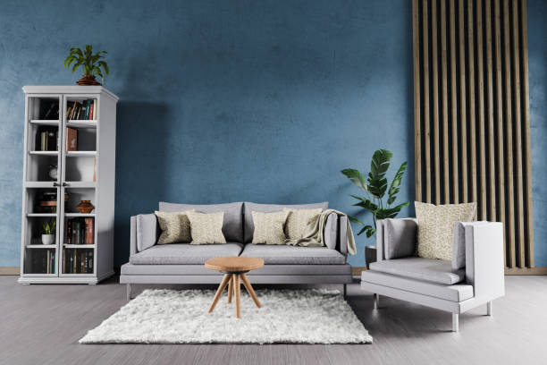 istock minimalistic modern elegant living room interior with single vintage sofa in front of blue wall, shelf and white carpet; copy space; 3D Illustration 1462268496