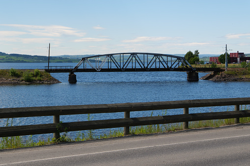 Railroad bridge over the Mjøsa near Hamar in the Norwegian Fylke, province of Innlandet directly on the pilgrimage trail St. Olavsleden, Gudbrandsdalsleden, Norway.