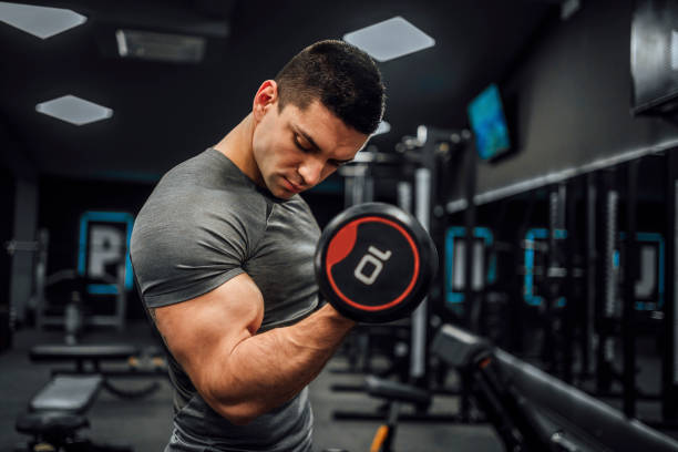 istock Man working out in the gym 1462278968