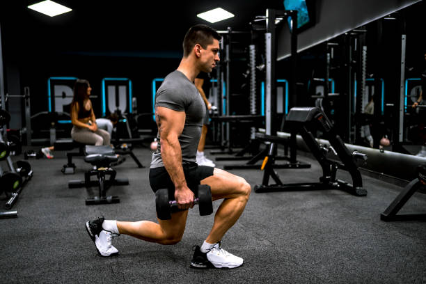 istock Young man training in the gym 1462280029