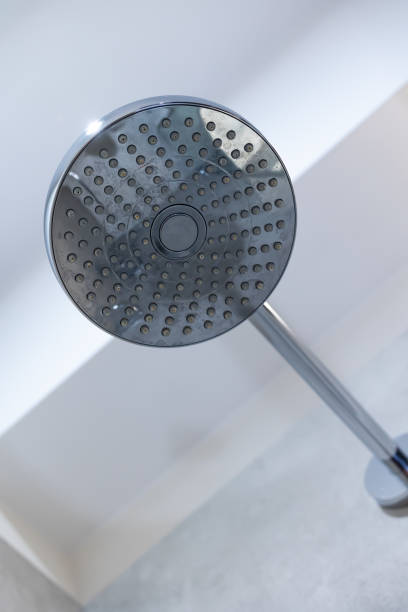 istock Shower head fixed to the shower tray wall. 1462288410