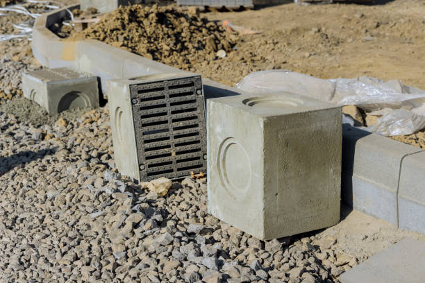 istock Road works construction on well concrete base during the laying and installation of stormwater drainage 1462297099