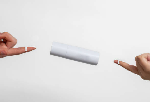 istock Female hands with blank cosmetic products on finger tips 1462301907