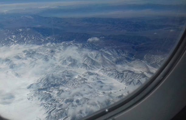 istock View of the mountains from the plane 1462319744