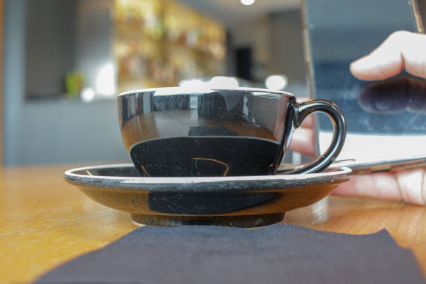istock one cup of coffee and a mobile phone 1462378687