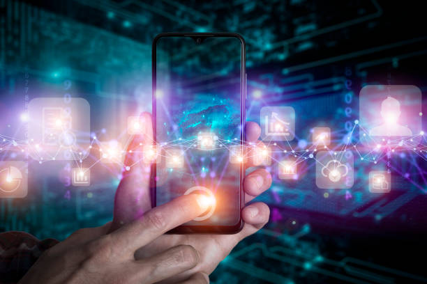 istock Big data technology background. Using smartphone against the background of visualization of a computer internet network, social connection, analytics, information. 1462382753