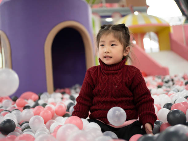 istock children in ocean ball 1462394356