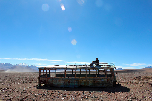 Potosi, Bolivia, november, 20, 2014\nAbandoned bus in the Bolivian altiplano desert