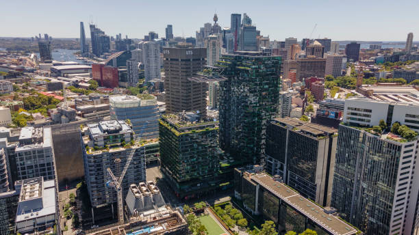 Aerial drone view of Central Park in Chippendale, Sydney, NSW, showing the building with its vertical hanging gardens and cantilevered heliostat stock photo