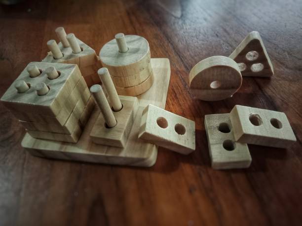 istock Natural wooden geometric shapes puzzle 1462406947