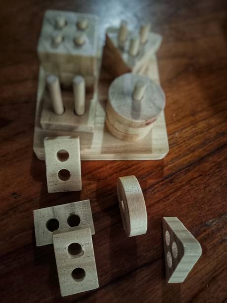 istock Natural wooden geometric shapes puzzle 1462406981