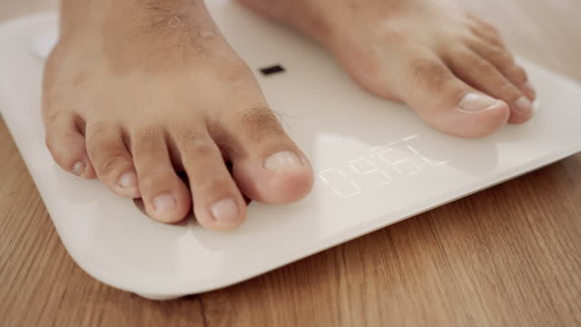Body weight on digital weighing scales.