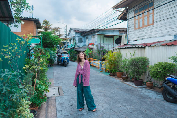 istock Woman exploring Wat Arun temple 1462431257