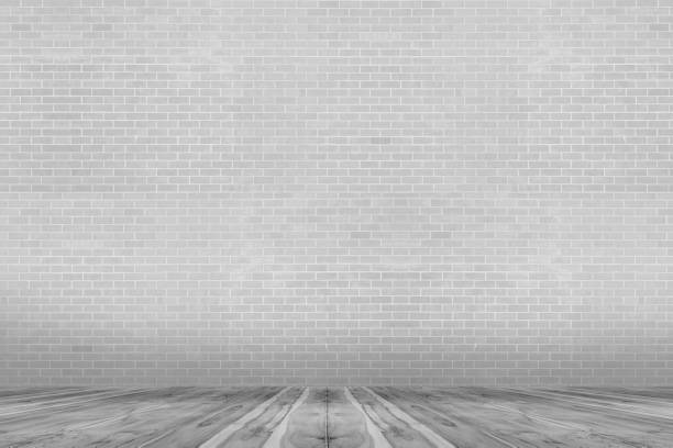 istock gray brick wall and gray floor wood background 1462431842