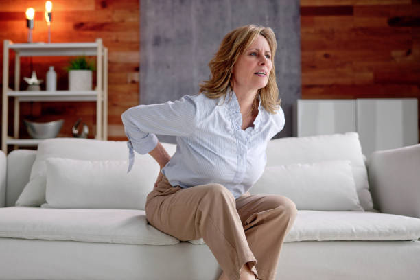 istock Woman Having Back Pain Or Backache 1462446542