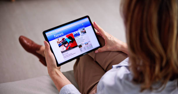 istock Reading News Website Or Electronic Newspaper 1462447673