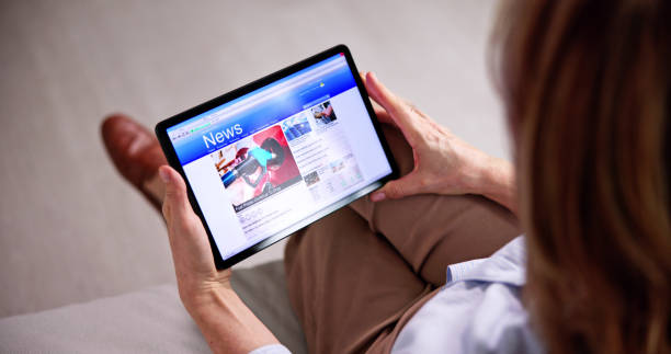 istock Reading News Website Or Electronic Newspaper 1462447694