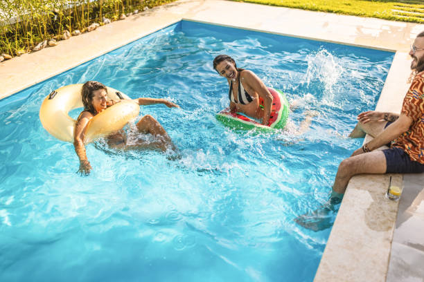istock Enjoying summer at swimming pool 1462500999