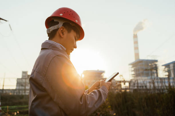 istock The engineer working in the power plant calls 1462517333