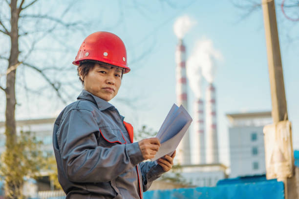 istock Engineers working in the power plant view the data report 1462521974