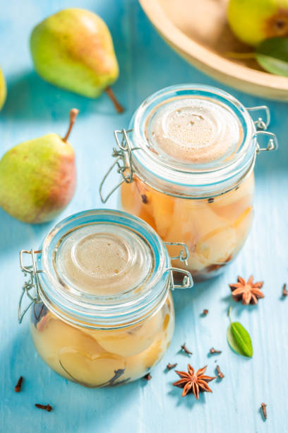 istock Sweet pickled pears in sugar and vinegar. 1462524112