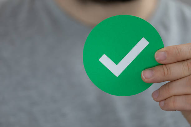 istock Man showing a tick sign 1462530925