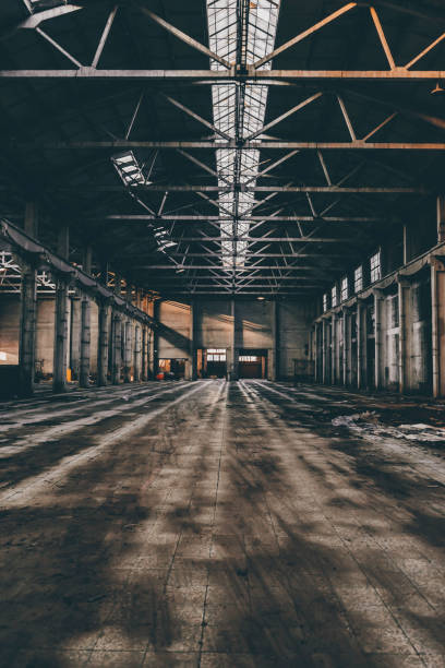 istock Scenic shot of a dark, abandoned building with a metallic ceiling 1462533301