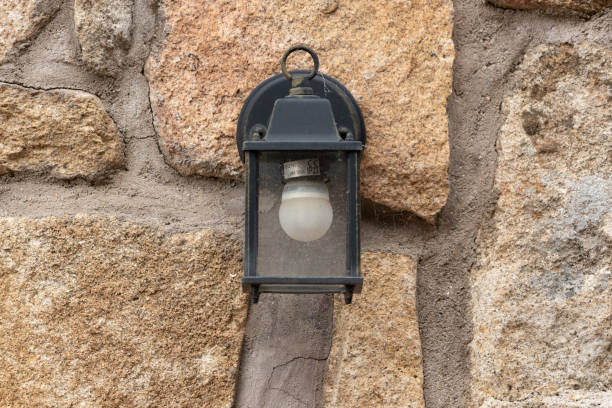 istock Closeup shot of a lamp on a wall background 1462534742