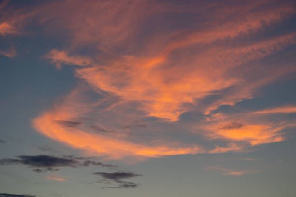 istock Scenic view of clouds floating in the sky during a bright sunset 1462543254