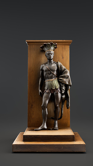 Emblem of The Black Man pharmacy from 1800s. Ancient fine art. Alloy sculpture. 3d Rendering, single object