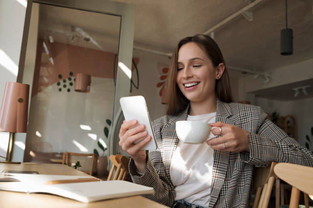 istock Young IT professional working from a coffee shop. 1462547524