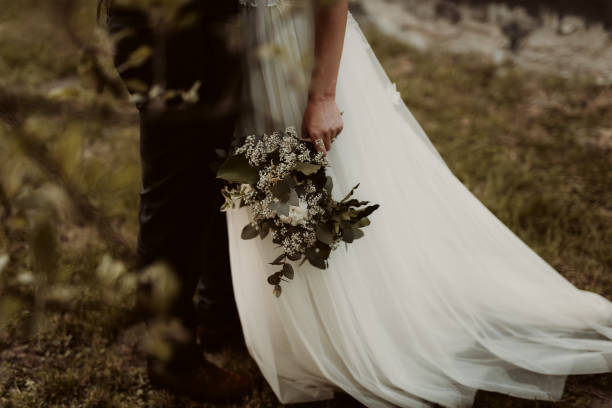 istock Bride and groom on their wedding day during a photo session 1462552600