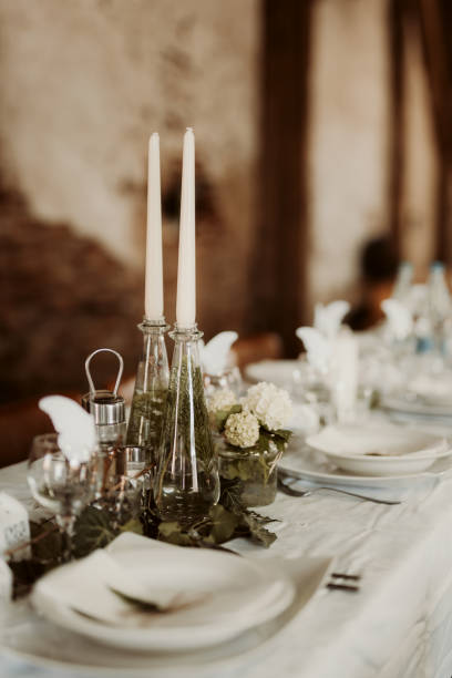 istock Selective focus shot of two candles in bottles on the table 1462552606