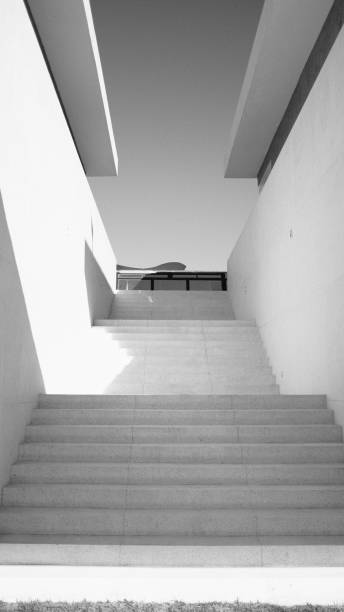 istock Vertical shot of a white staircase with a sky in the background 1462553802