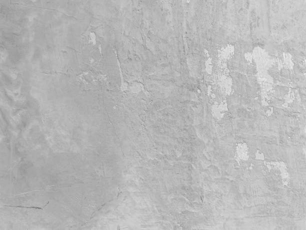 abstract black and white tone of rough weatherd texture ancient  concrete or cement wall gradient background - weatherd imagens e fotografias de stock