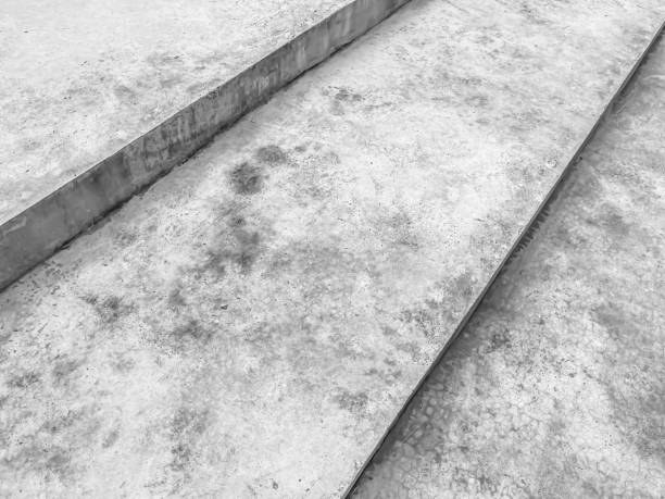 istock Abstract black and white tone concrete or cement stair or step for rough texture, diagonal stripe or line pattern and gradient background concept and idea 1462562367