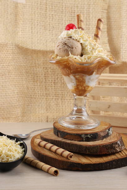 istock Caramel and chocolate ice cream with a cherry on top 1462562440