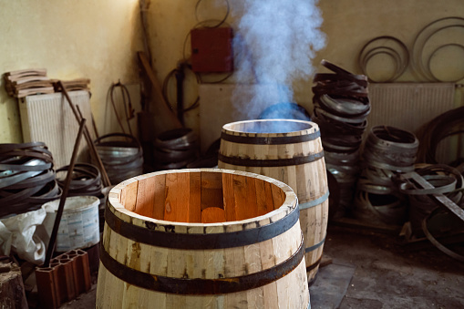 Oak barrel burning, to gain aroma for the alcohol which will be stored in it