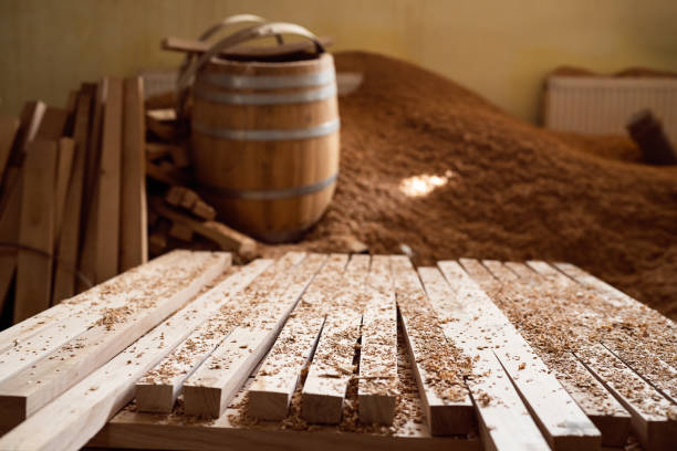 Stacked oak wooden steves at the barrel workshop