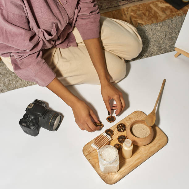 istock Girl prepare salt, clay, cream, fruit and sticks 1462591993