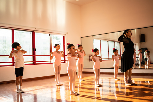Ballet dancers warming up at ballet studio