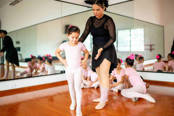 istock Teacher giving instruction to ballet dancer at the dance studio 1462613244
