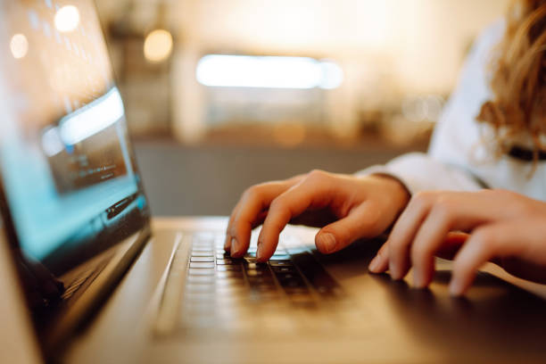 istock Female hands working on a laptop, close-up. Technology, Freelance, online course, remote work, internet concept 1462613245