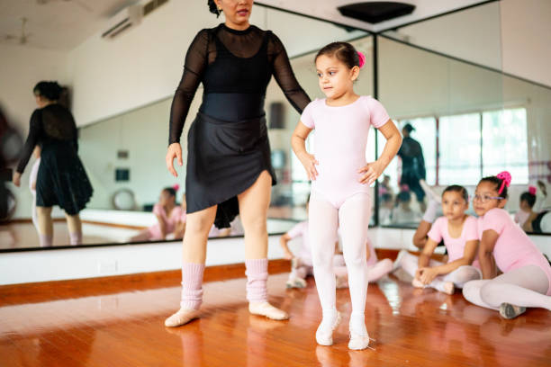 istock Teacher giving instruction to ballet dancer at the dance studio 1462613268