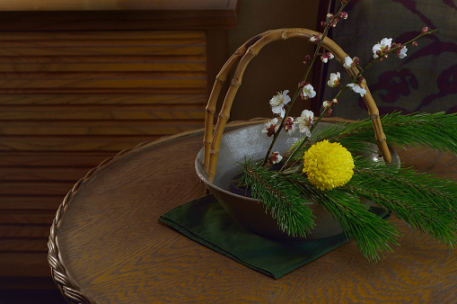 Flower Arrangement with White Plum Blossoms/Studio Shot/A Flower Vase is hand-made.