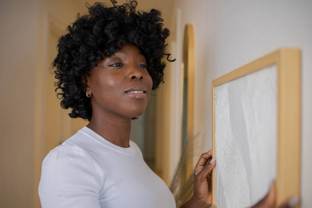 istock Woman moving into a new apartment 1462616275