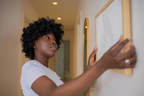 istock Woman moving into a new apartment 1462616289