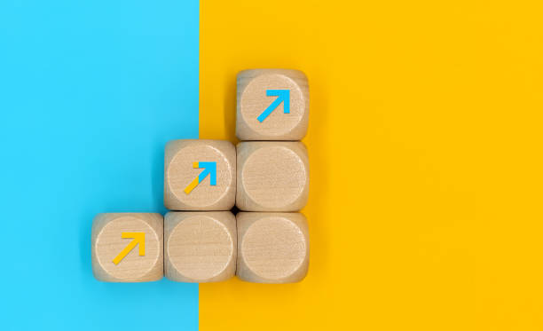 istock Virtual target board and increasing arrow which print screen on wooden cube. Business achievement goal and objective target concept. 1462617969