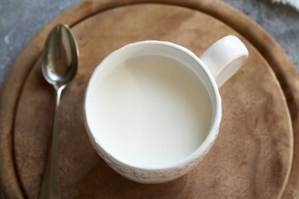 istock Probiotic kefir drink in a cup, top view 1462628565